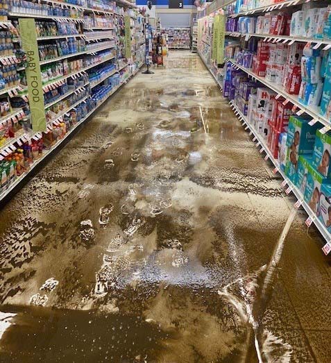 GROCERY STORE AISLE WATER REMEDIATION BEFORE PHOTO